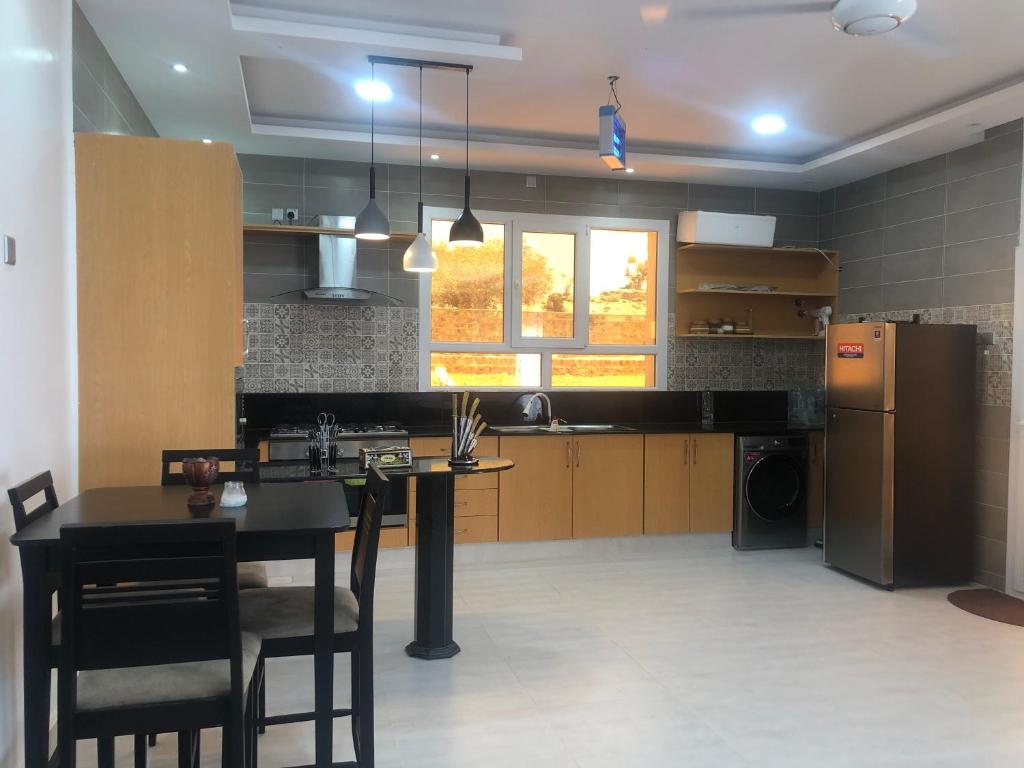 Kuchyň nebo kuchyňský kout v ubytování Sab Bani Khamis House