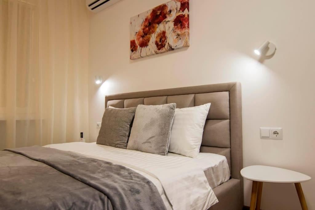 Postel nebo postele na pokoji v ubytování Osokorky Delux Apartment