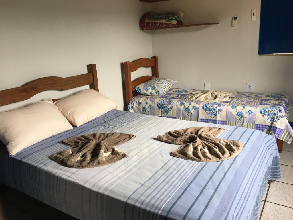 Postel nebo postele na pokoji v ubytování Pousada Lavramor