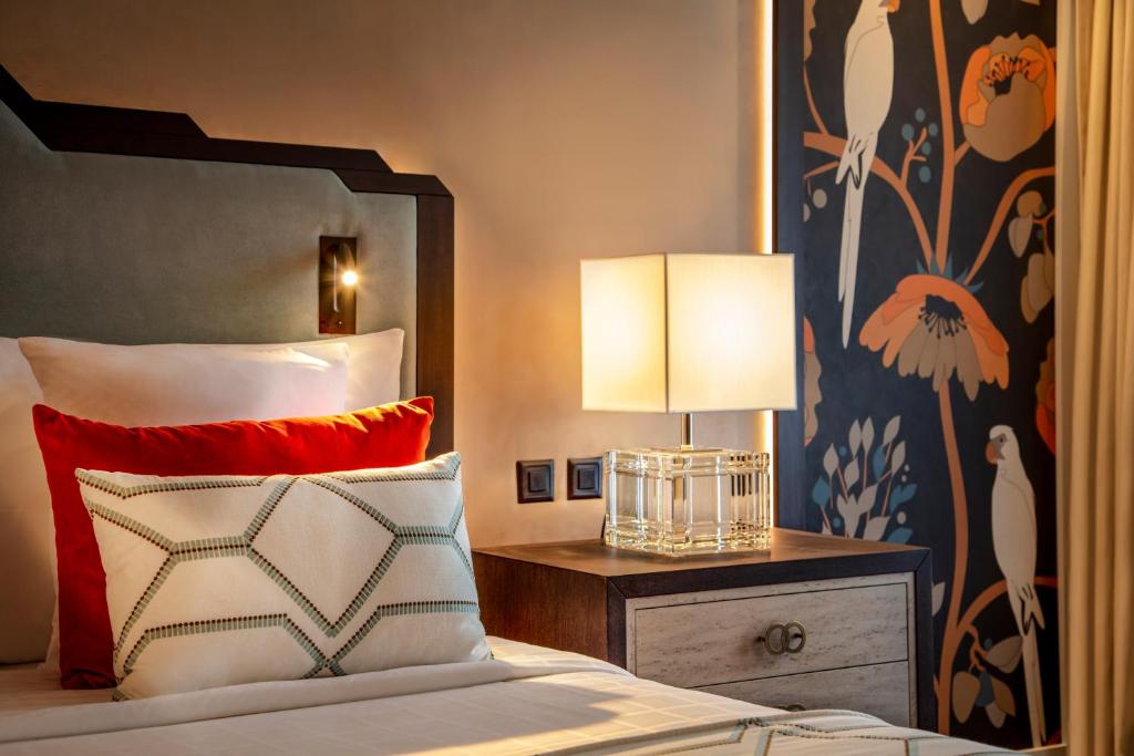 Postel nebo postele na pokoji v ubytování Hotel Bristol