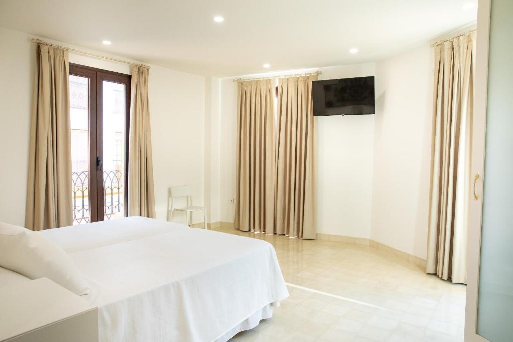 Posada Boutique El Gallo Morón - Habitación Cuádruple Con Balcón