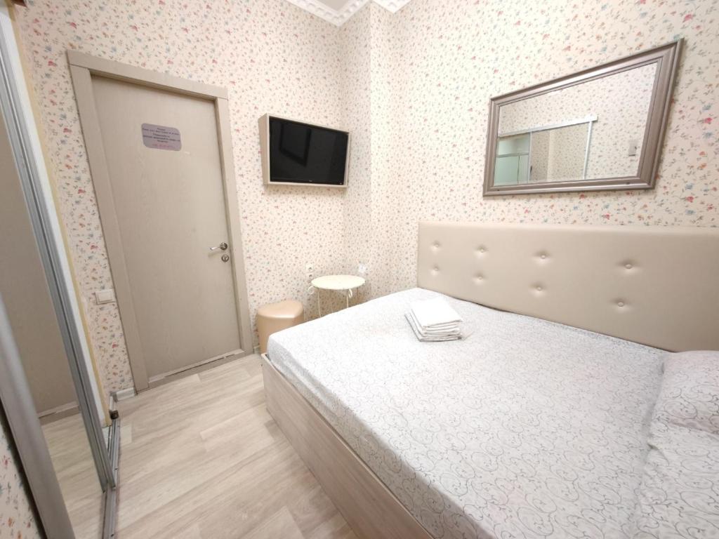 Postel nebo postele na pokoji v ubytování HOTEL ЗiРКА