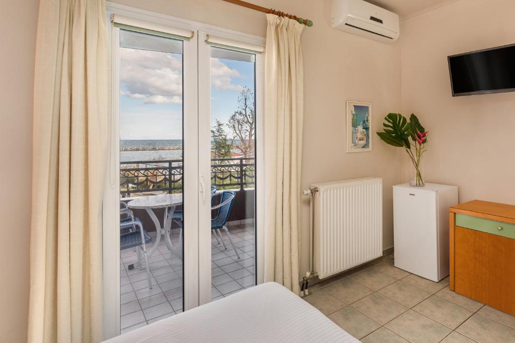 TV a/nebo společenská místnost v ubytování Dias Hotel Platamon
