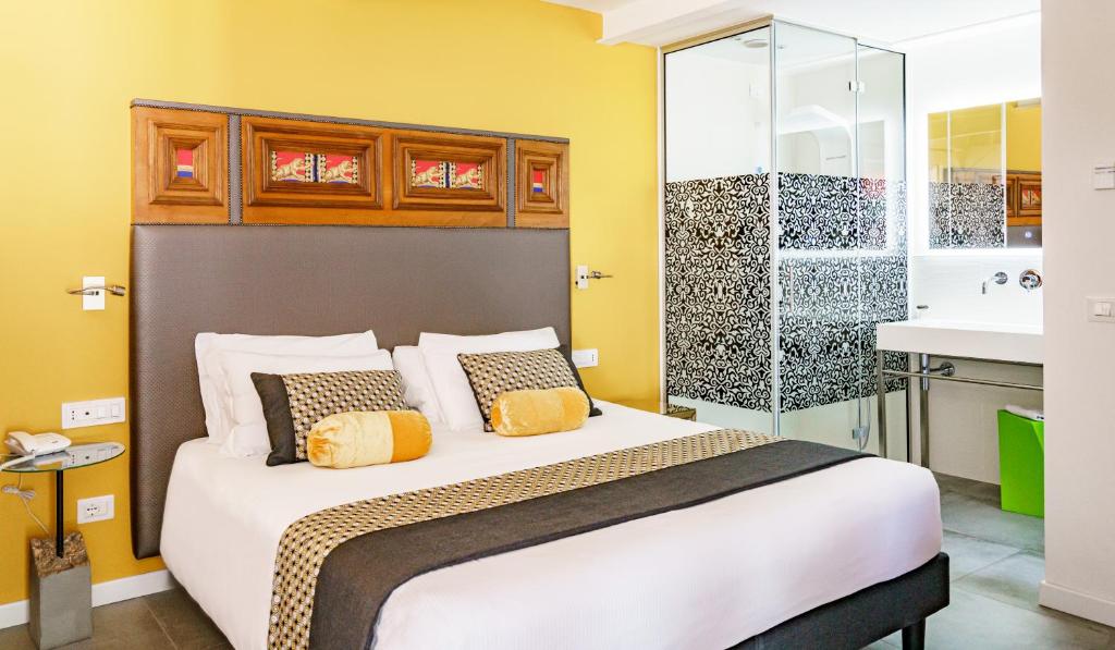 Posteľ alebo postele v izbe v ubytovaní Hotel Lampara