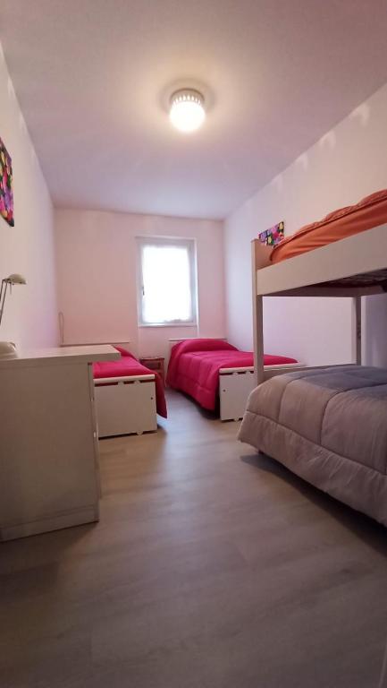 Postel nebo postele na pokoji v ubytování Oasi di Pace e Tranquillità