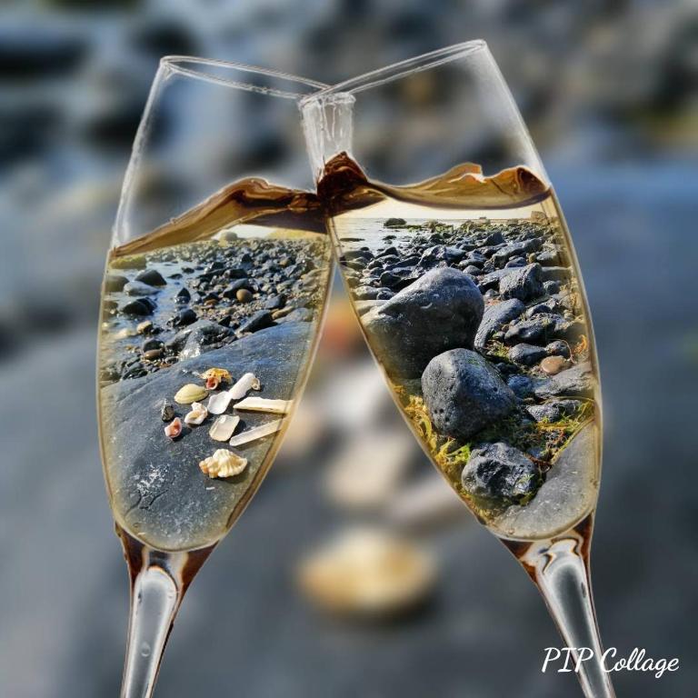 a glass of wine with rocks in it at Puffin rooms in Lisdoonvarna