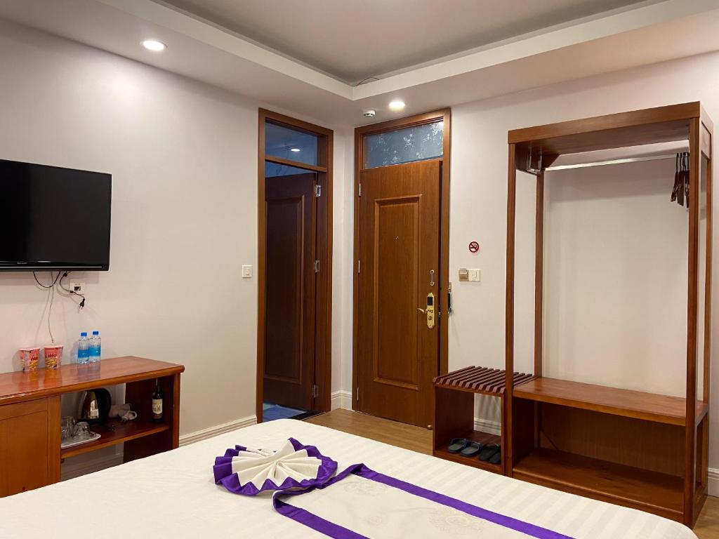 TV a/nebo společenská místnost v ubytování Peach Valley Hotel Dalat