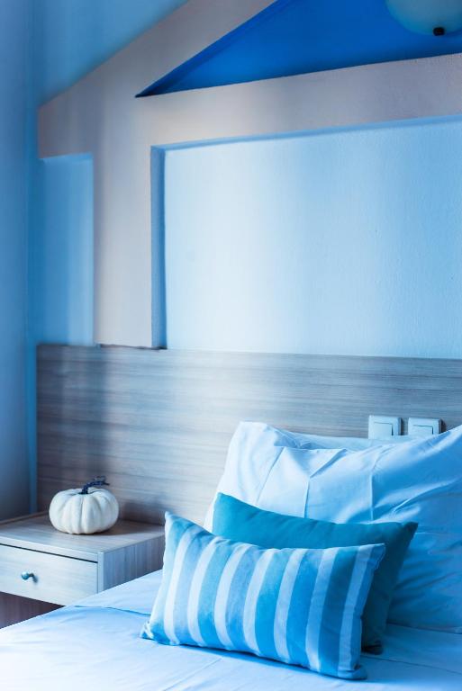 Postel nebo postele na pokoji v ubytování Ilios Malia Hotel Resort