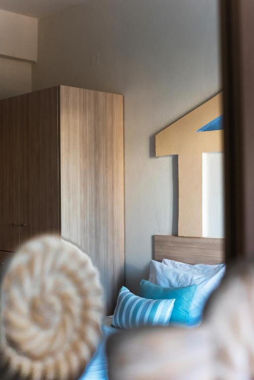 Postel nebo postele na pokoji v ubytování Ilios Malia Hotel Resort