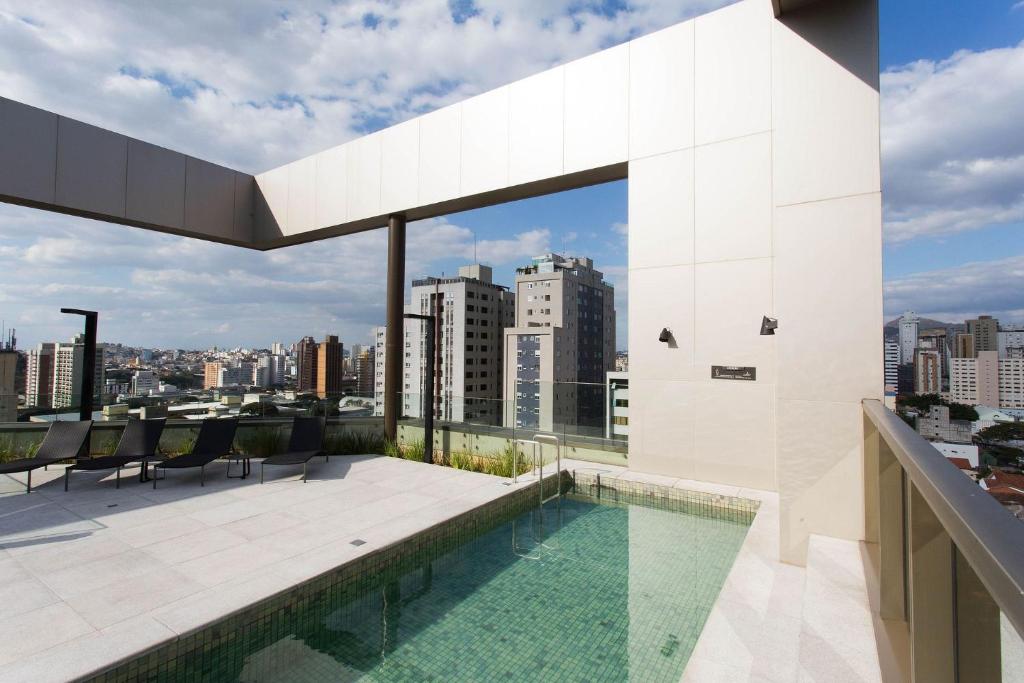 a view from the roof of a building with a swimming pool at Locking's Santo Agostinho 2 in Belo Horizonte