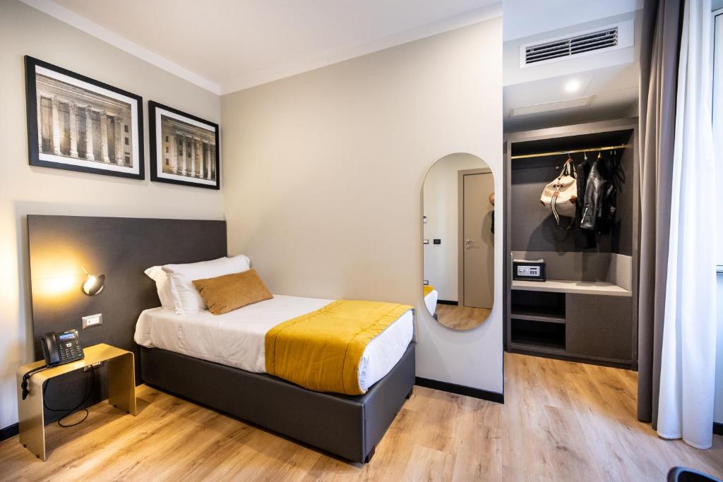 Postel nebo postele na pokoji v ubytování The Cross Hotel