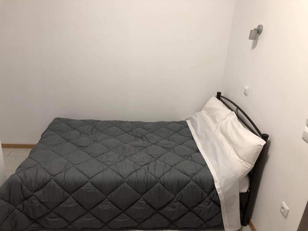 Ένα ή περισσότερα κρεβάτια σε δωμάτιο στο panos hause