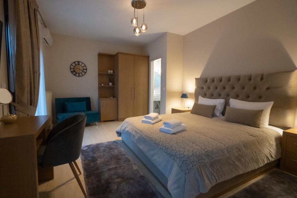 Postel nebo postele na pokoji v ubytování Zillis Apartments