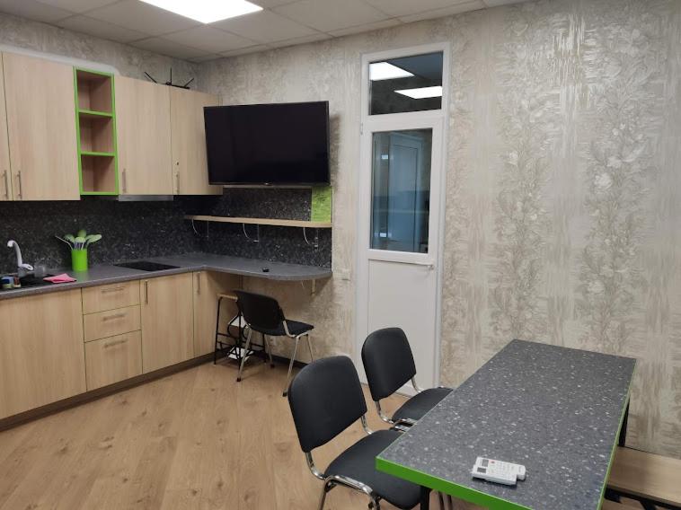 Kuchyň nebo kuchyňský kout v ubytování STAR CITY Hostel