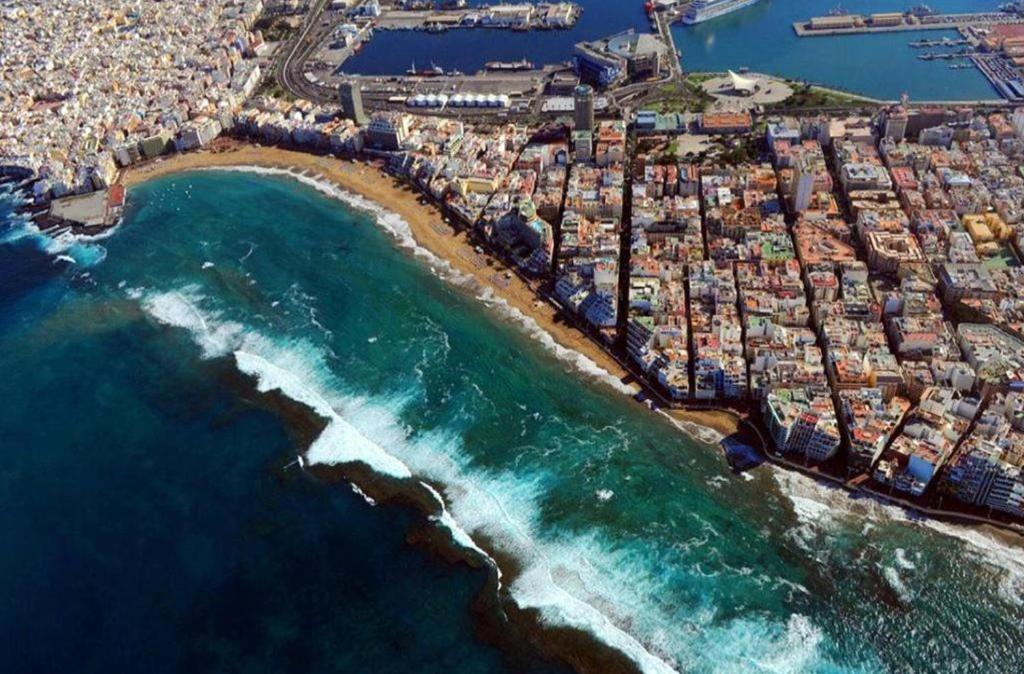 an aerial view of a city and the ocean at Guanarteme Vista Surf in Las Palmas de Gran Canaria