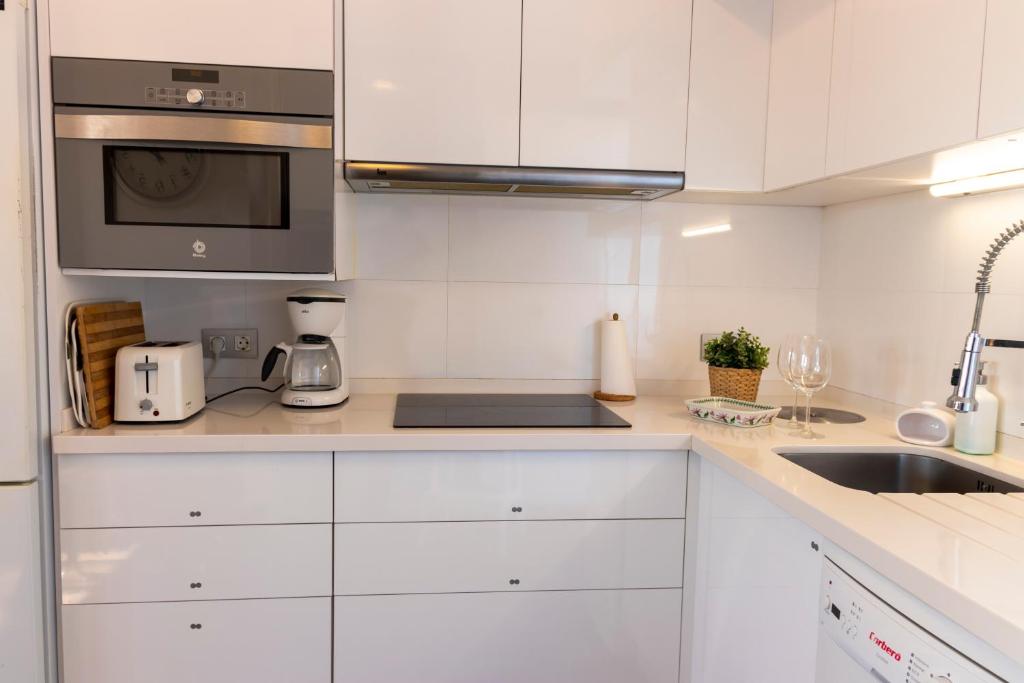 Kuchyň nebo kuchyňský kout v ubytování Suitur apartamento Elviria Marbella beach view