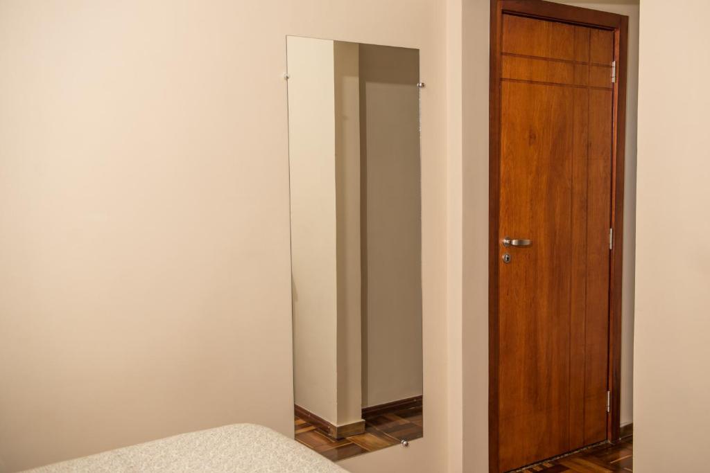 Quarto Triplo com Banheiro Privativo