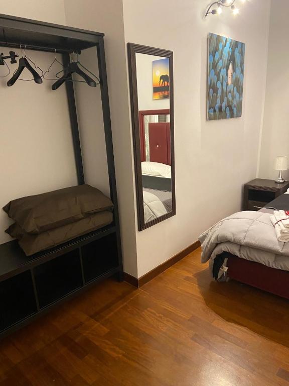 Łóżko lub łóżka w pokoju w obiekcie Bed and Breakfast Impruneta28