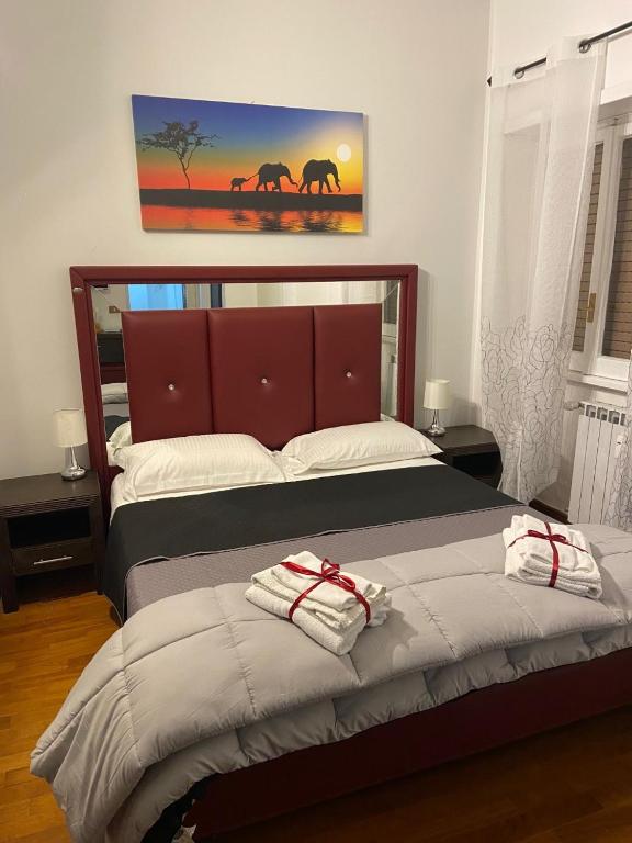 Łóżko lub łóżka w pokoju w obiekcie Bed and Breakfast Impruneta28