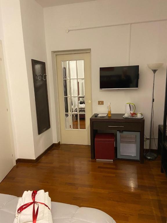 Telewizja i/lub zestaw kina domowego w obiekcie Bed and Breakfast Impruneta28
