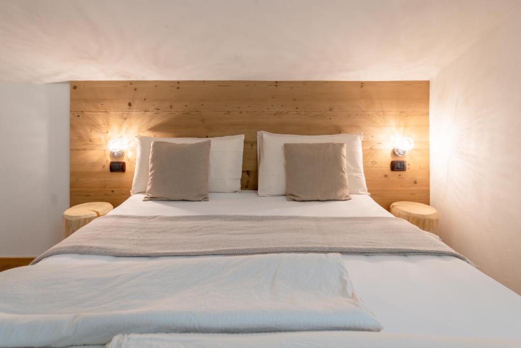 Postel nebo postele na pokoji v ubytování Albergo Negritella