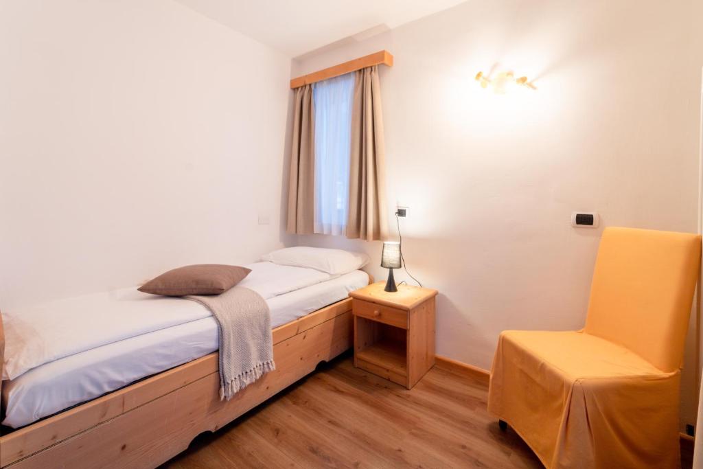 Postel nebo postele na pokoji v ubytování Albergo Negritella