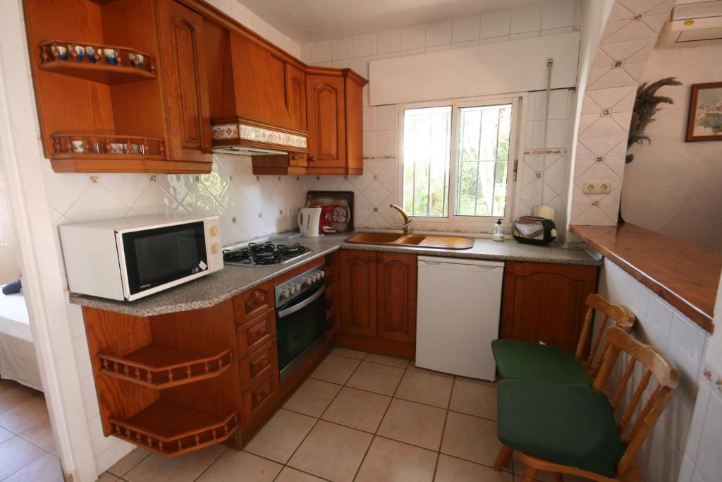 Kuchyňa alebo kuchynka v ubytovaní Casacool