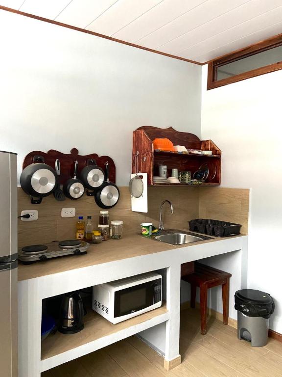 Kuchyň nebo kuchyňský kout v ubytování AmimodoBeachRooms