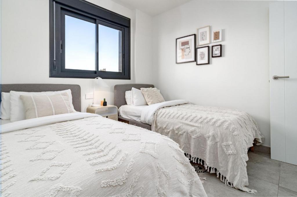 Posteľ alebo postele v izbe v ubytovaní INF12A- Apartment close to beach and old town