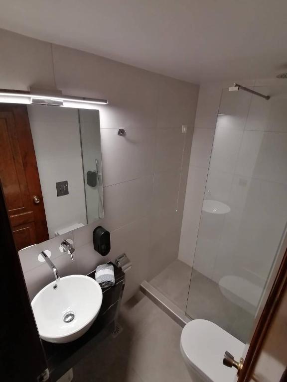 Koupelna v ubytování Alexis Hotel