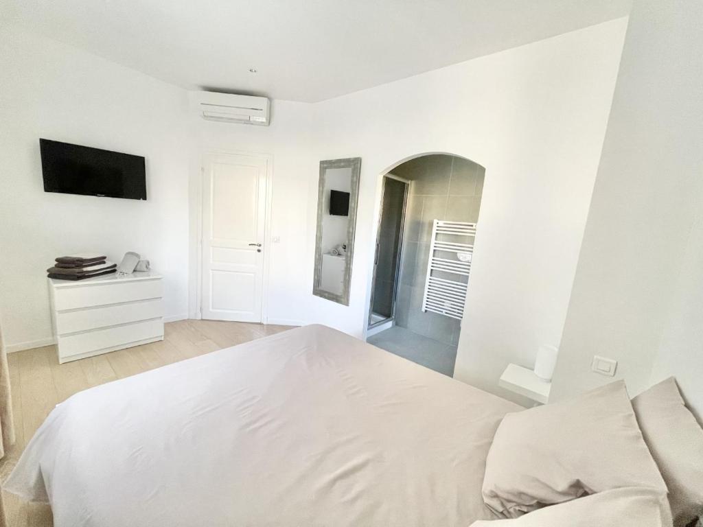 Postel nebo postele na pokoji v ubytování Le Clos des Lauriers