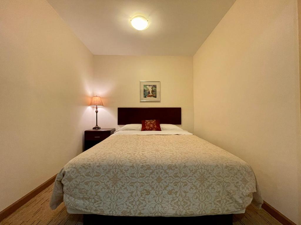 Postel nebo postele na pokoji v ubytování Valhalla Inn