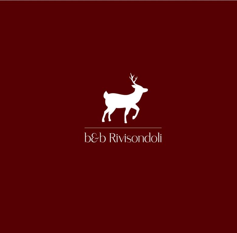 a white deer standing on a red background at b&b Rivisondoli in Rivisondoli