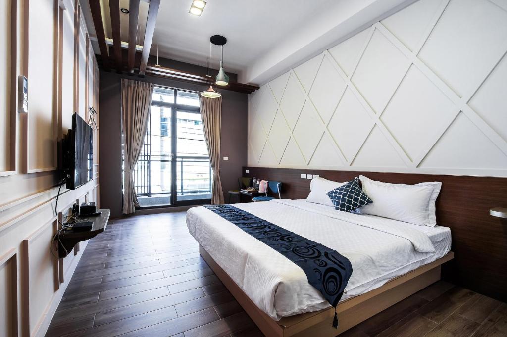 Postel nebo postele na pokoji v ubytování Toutsu Asami Guest House