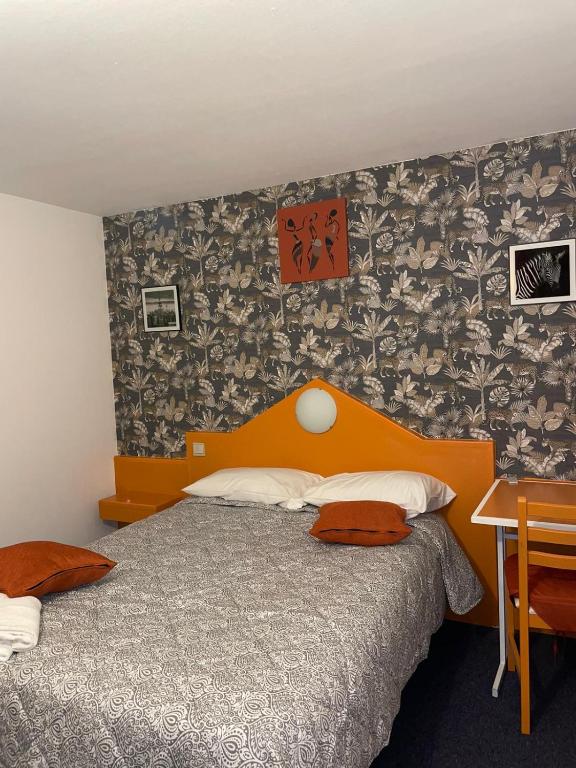 Postel nebo postele na pokoji v ubytování Astrotel Romorantin-Lanthenay Soirée étape