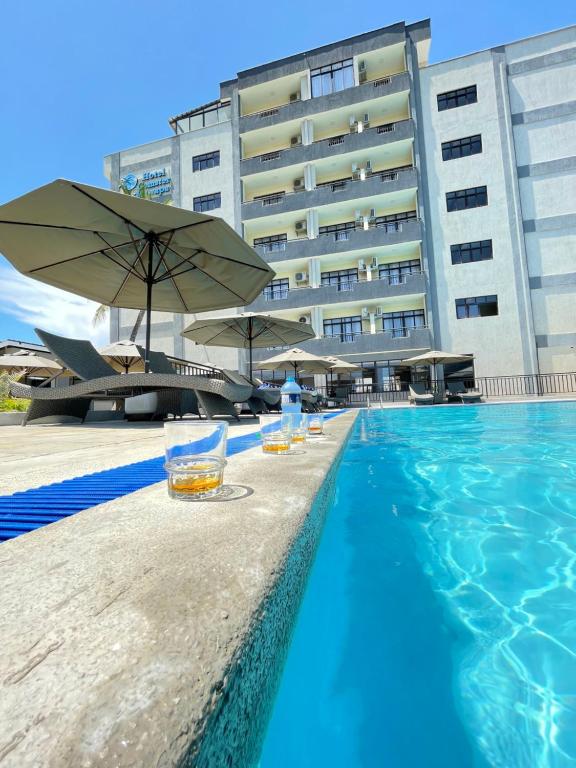 Bazén v ubytování Hotel Comster Mtwapa nebo v jeho okolí