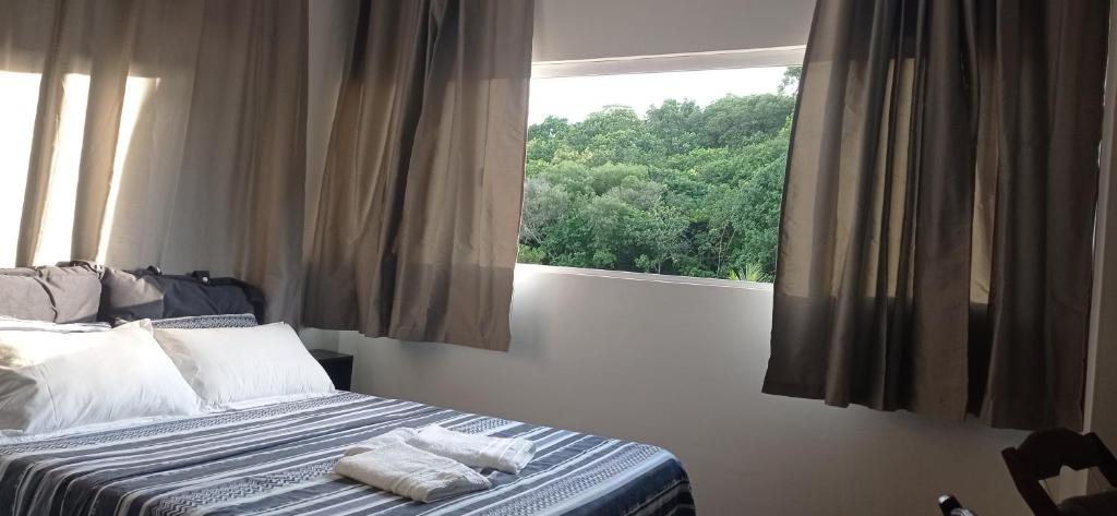 Postel nebo postele na pokoji v ubytování Pousada Viver Bahia Morro Sao Paulo