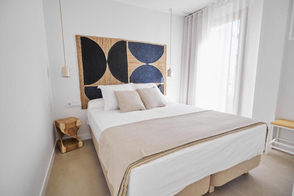 Postel nebo postele na pokoji v ubytování Slow Home Apartments