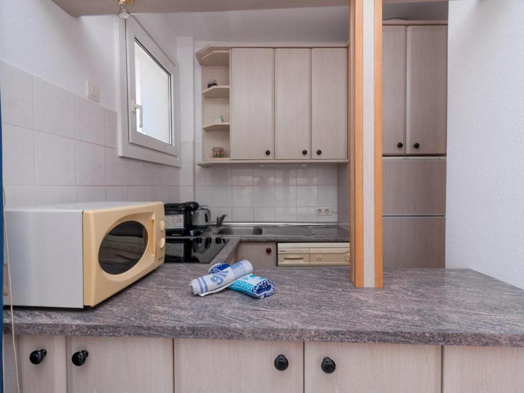 Kuchyň nebo kuchyňský kout v ubytování Nerja Sun Apartment Solmarengo Torrecilla