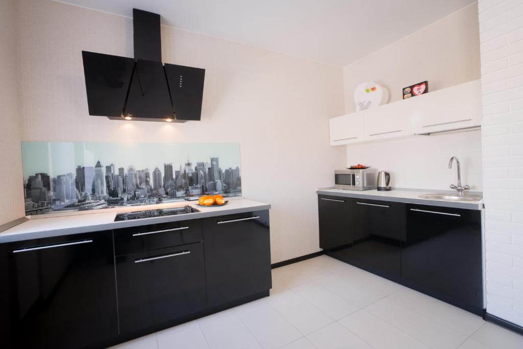 Una cocina o zona de cocina en Like Home Apartments na Volskom 15