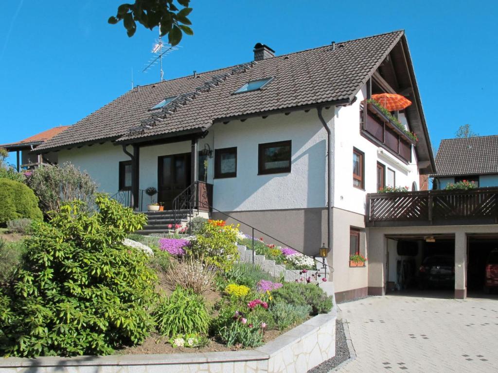 a house with a garden in front of it at Apartment Wartbuck by Interhome in Ühlingen-Birkendorf