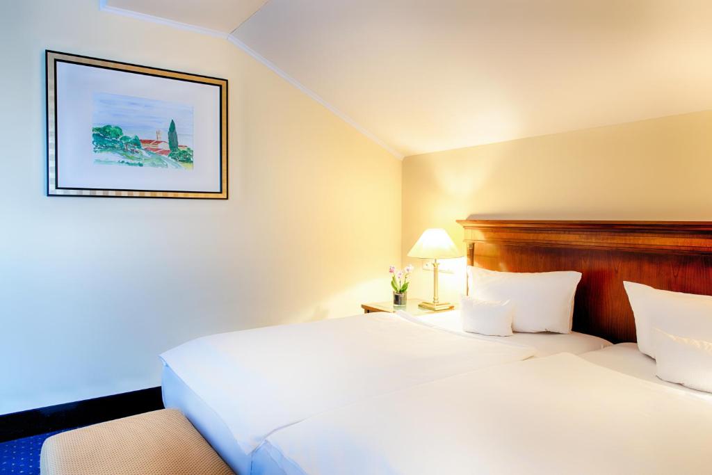 Cama ou camas em um quarto em Hotel Villa Geyerswörth