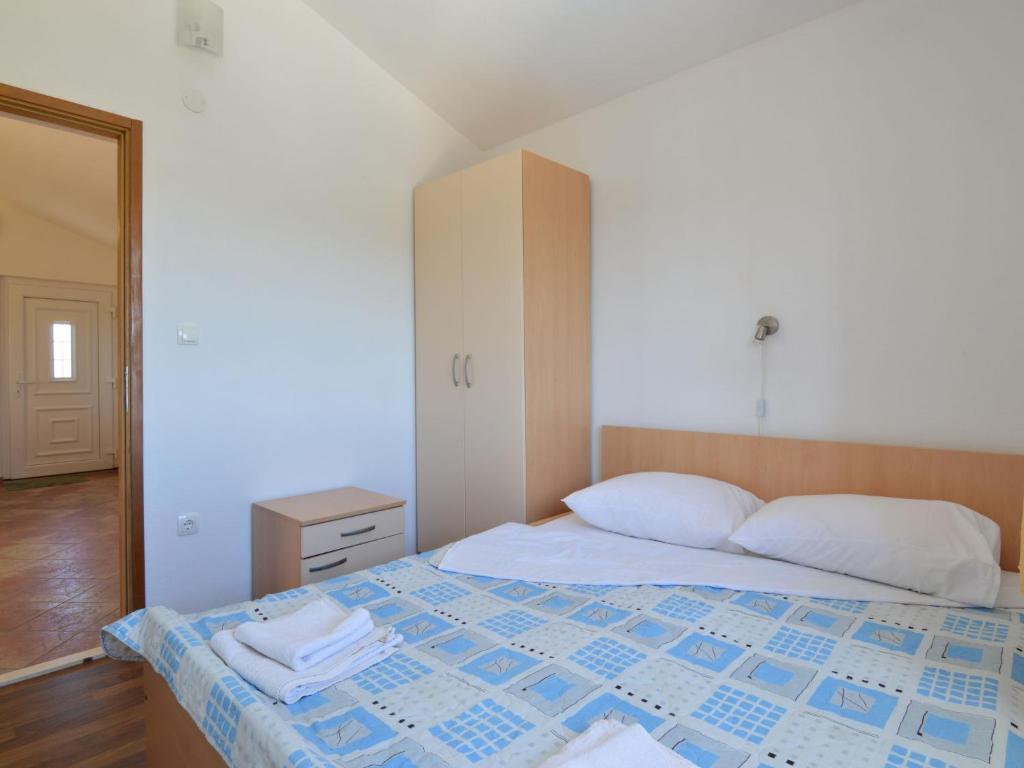 Posteľ alebo postele v izbe v ubytovaní Holiday Home Basic by Interhome