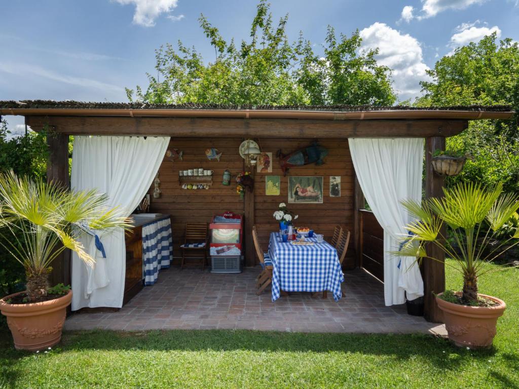 A garden outside Holiday Home Cadellura by Interhome