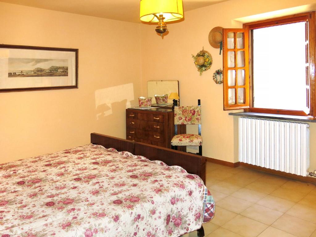 Łóżko lub łóżka w pokoju w obiekcie Holiday Home Castagni I - Castagni II by Interhome