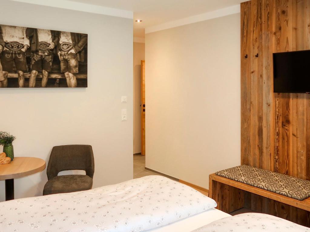TV a/nebo společenská místnost v ubytování Apartment Chalet Edelweiß by Interhome