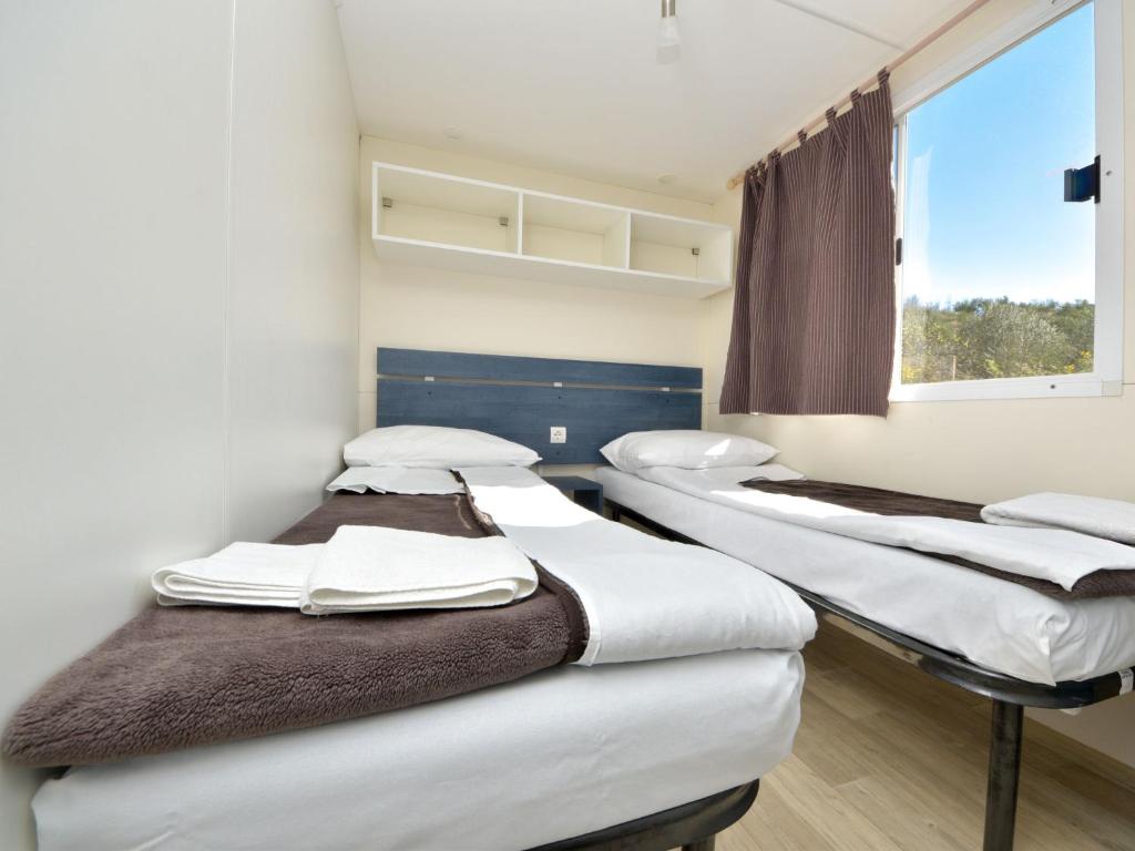 Posteľ alebo postele v izbe v ubytovaní Holiday Home Palma-3 by Interhome