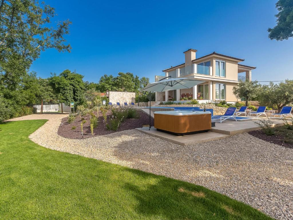 Zahrada ubytování Villa Roko by Interhome