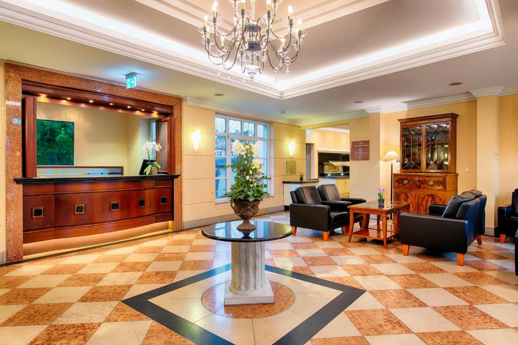 Uma área de estar em Hotel Villa Geyerswörth