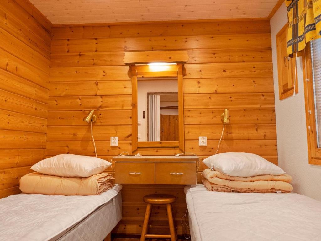 Postel nebo postele na pokoji v ubytování Holiday Home Lauri 5 by Interhome
